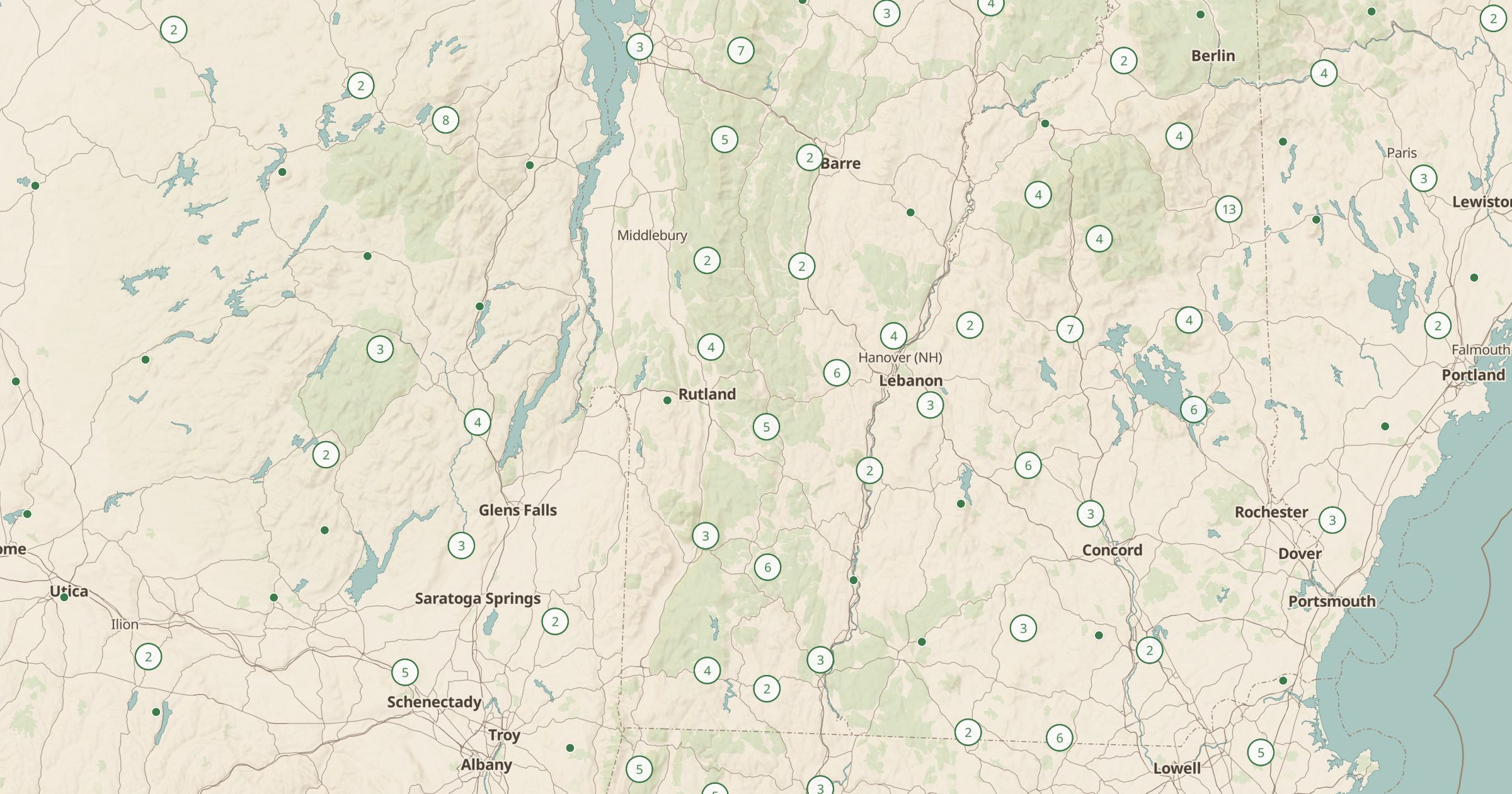 Map of Vermont, New Hampshire and upstate New York with the Ski Areas (OpenSkiData) layer turned on in Bottomless Maps