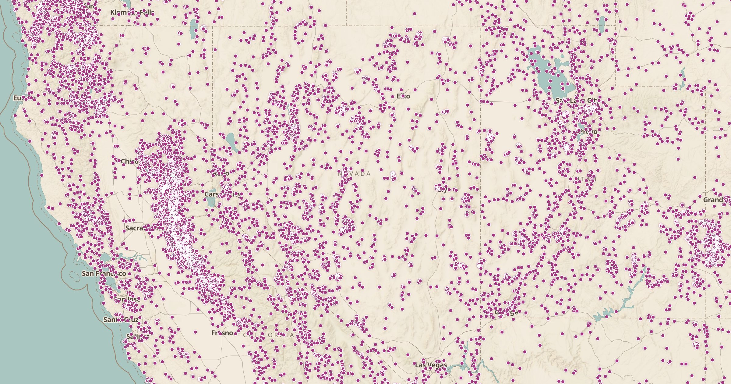 Map of Nevada and northern California densely speckled with white dots marking historic mines and prospects